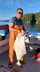 White Glows Blue Bullet Jig With Orange Eyes